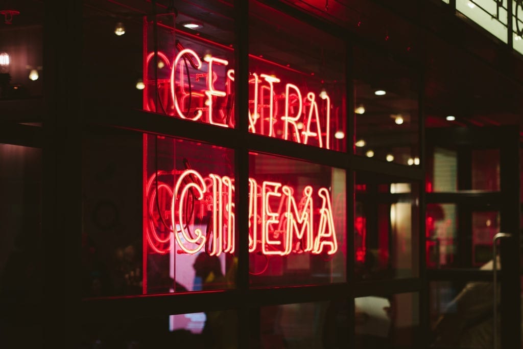 neon sign that says central cinema