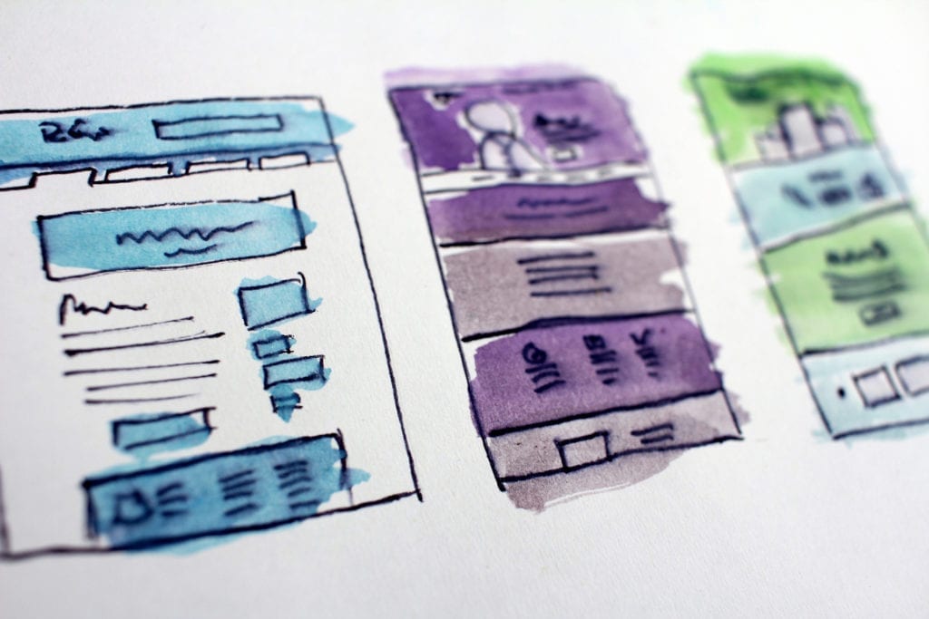 sketches of digital marketing strategy plans colorful grids and charts and posts and ux design