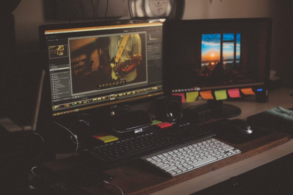 two monitors computer on desk