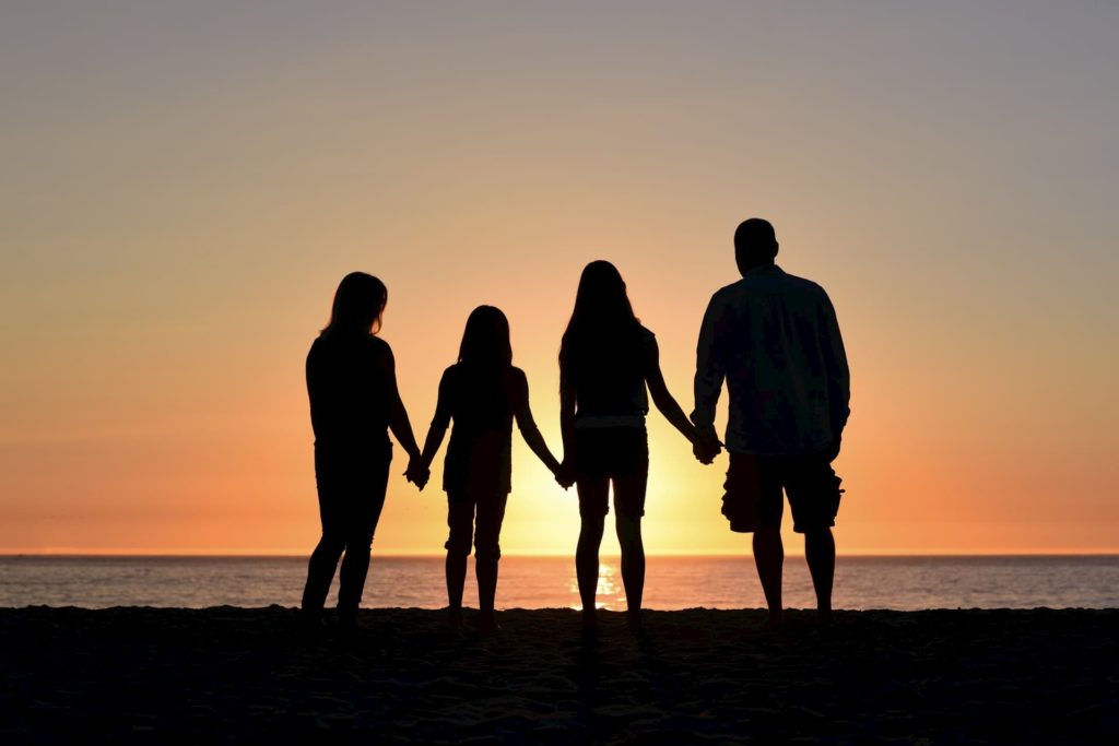 A family holding hands