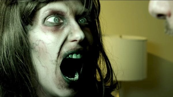 When one of her guests is unexpectedly possessed, a desperate hotel manager turns to a local exorcist who may be more concerned with documenting his own exploits than saving a life. WINNER OF 13 LOL JAX FILM FESTIVAL AWARDS! Including Best Film, Best Actor, Best Cinematography, and more... Follow us on Facebook! American Exorcist: https://www.facebook.com/FatherBenji AfterShock Pictures: https://www.facebook.com/aftershockpi... Starring Jas Abramowitz, Kat McLeod, Jaron Wallace, Jonathan O'Leary, Kelly Kates, and Kate McManus Writer/Director/Producer/Editor - Myles Hughes DP/Producer/Colorist - Jaron Wallace Composer - Jeff Piper Special Makeup Effects - Hillary Warren and Brad Shier Assistant Director - Alexa Wint Gaffer - Thomas Siedle Sound Engineer - Jason Blankenship Assistant Camera/Colorist - Nicholas Lorini Production Assistant - Brandon Miles