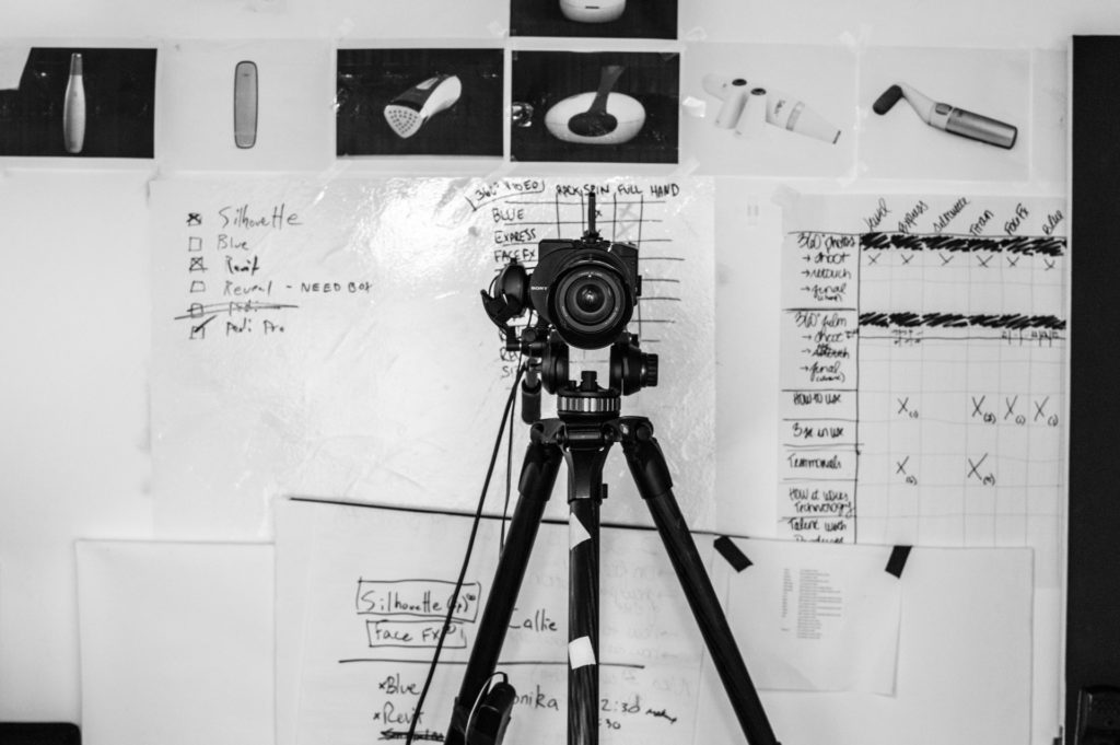 camera in front of a white board the film fund